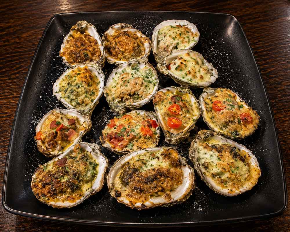 Dozen baked oysters sampler at Tin Top Restaurant in Bon Secour Alabama